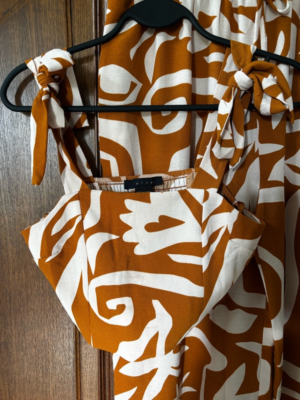 Tulléa Tie-Shoulder Patterned Jumpsuit in Rust & Cream